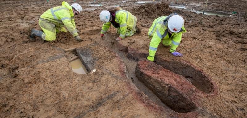 archaeologists excavating a Roman kiln