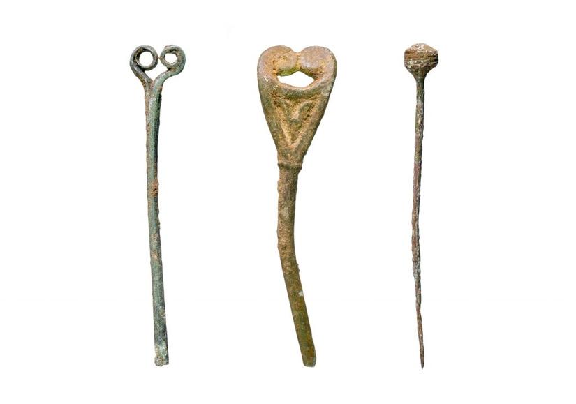 Three metal pins with decorated heads