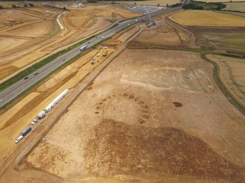 Aerial photograph of archaeological excavations next to a road